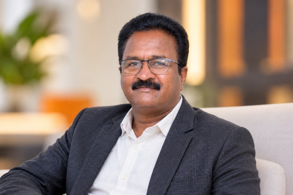 Portrait of Mr. Ramesh Raju, Director of Finance and Administration
