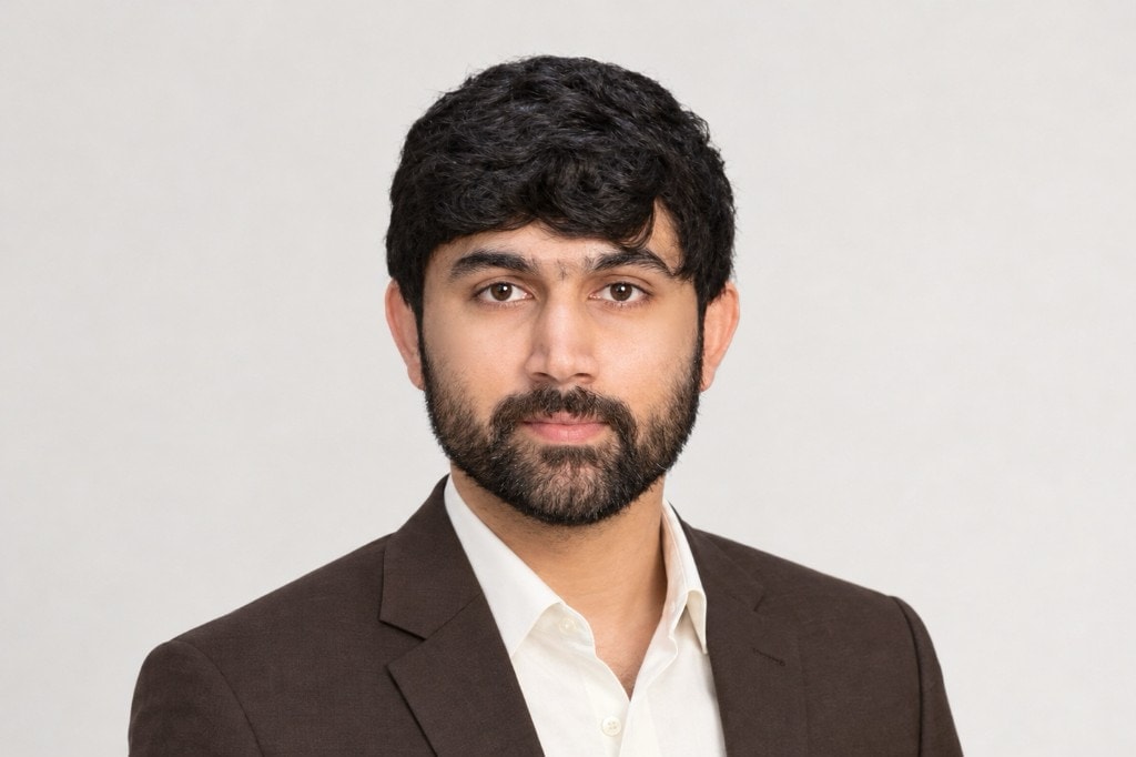 Portrait of Dr. Varshith Vallabhaneni, Head – Information Technology & Human Resources
