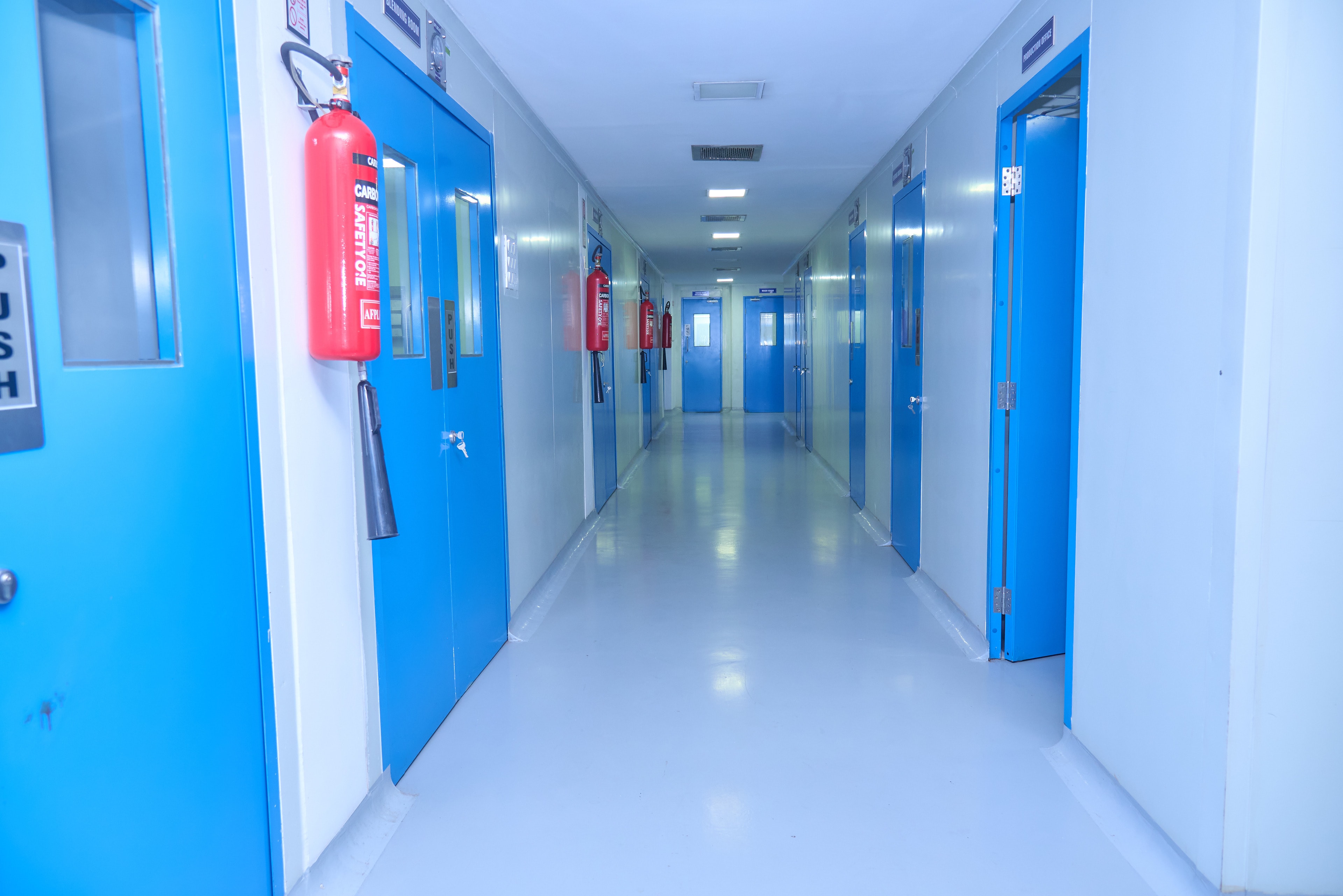 Manufacturing cleanroom corridor with epoxy flooring and coving
